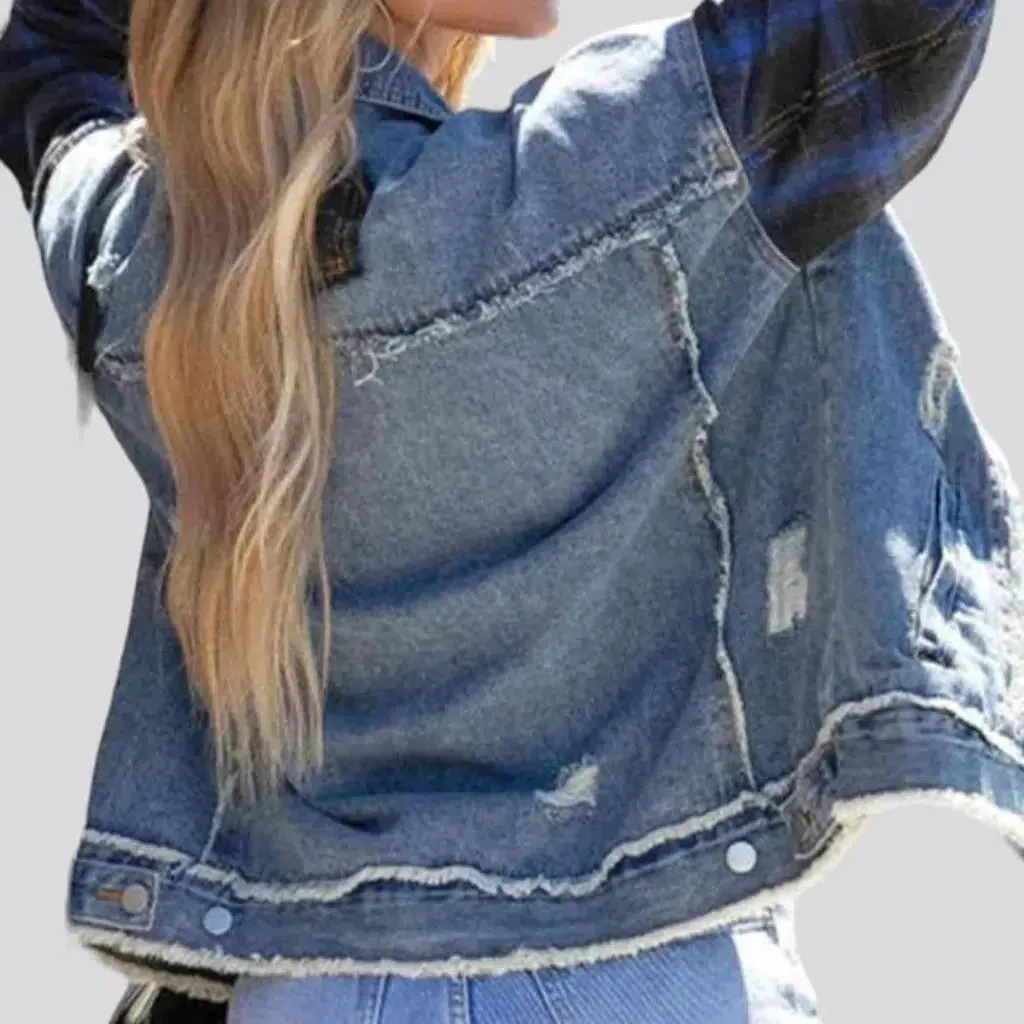 Light-wash distressed jean jacket for ladies